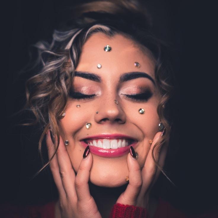 Alex Parker, Lead Design Curator at GlenCanvasStation, reviewing corporate floral arrangements